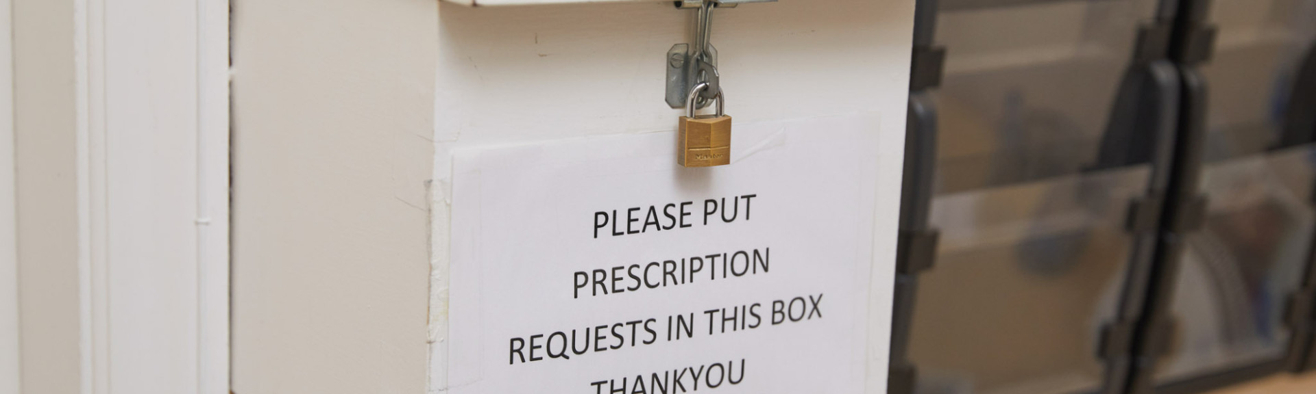A photo showing a prescription drop box