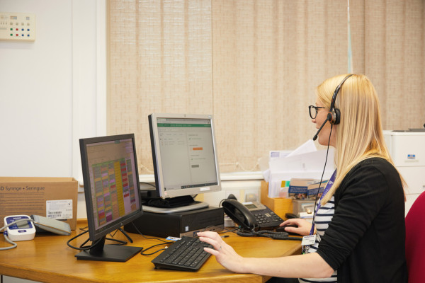 A photo showing Dr Kennett on the phone