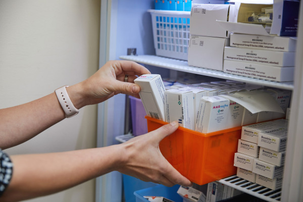 A photo showing a fridge containing vaccines